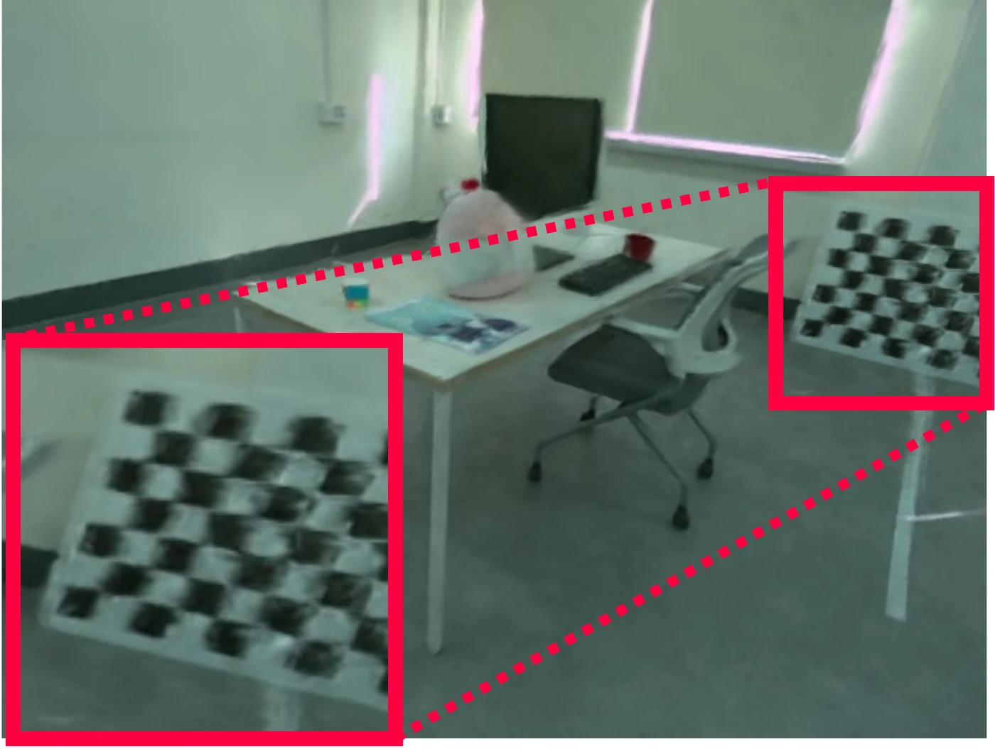Novel view rendered without the pose-dependent Gaussian model: the checkerboard shows double edges and blur.